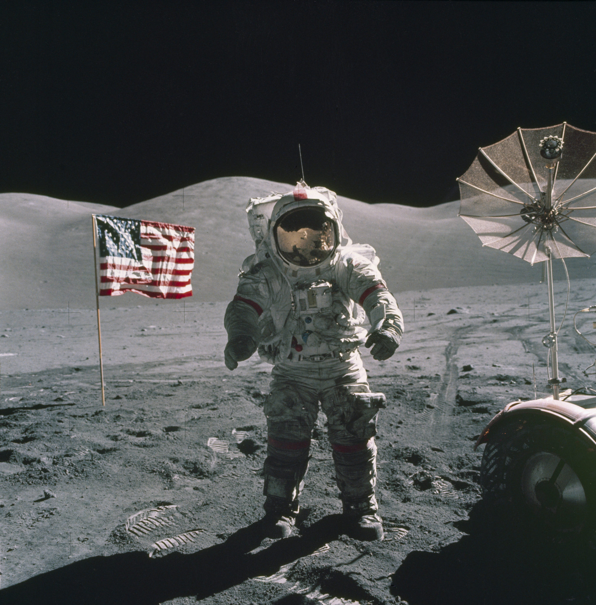 APOLLO 17 ASTRONAUT WITH AMERICAN FLAG ON MOON, DECEMBER 1972